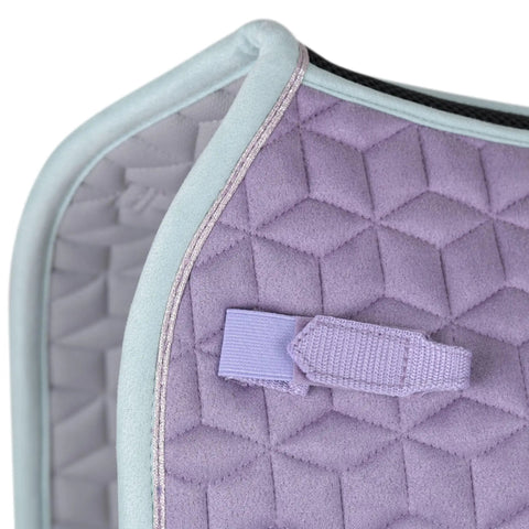 Close-up of Suede Elite Air Tec Dressage Saddle Pad with quilted Lilac suede, vegan leather girth patch, and breathable spine