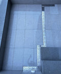 Heavy Duty Stainless Steel Patio Water Drain Channel Kit With Right Angle Grate For Concrete Floors installed on tiles