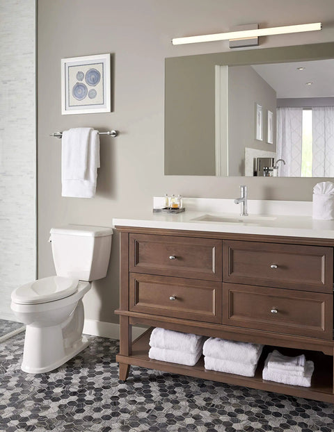 Modern bathroom with Parma Single Handle Lavatory Faucet With Metal Touch Down Drain, chrome finish on the sink.