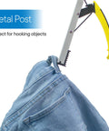 RMS 26-inch folding grabber reacher with ergonomic yellow handle grabbing a jeans pocket (front view).