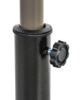 Close-up of Heavy Duty 21 Pound Bronze Umbrella Base With 17 Inch Diameter For Patio Deck Porch Poolside And Backyard Stability