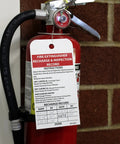 Fire Extinguisher Recharge and Inspection Tag Made on Synthetic Paper Polytag White for Easy Compliance attached to extinguisher