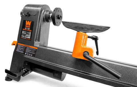 Beefy Variable Speed Benchtop Wood Lathe With A Knockout Six Amp Motor And Wide Open 14 By 20 Inch Swing Capacity For Slick Bowl Turning and visible tool rest.