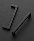 Square Bar Black Matte Cabinet Drawer Pulls 20 Pack Center To Center Three Quarters Inch Overall Length About Four Inches 9mm Width 28mm Projection Zinc Handles For Kitchen Cabinets, shown on black background