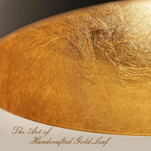 Close-up of handcrafted gold leaf interior of Boss Black And Gold Leaf Pendant Light with Handcrafted Metal Shade Vintage Ceiling Fixture.