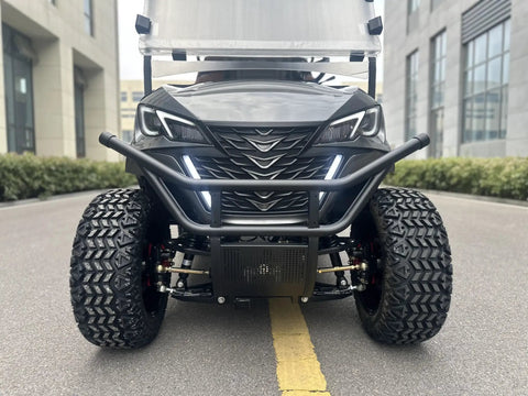 White 4 Seater Electric Golf Cart Featuring Flip Up Seats 48 Volt 150 Amp Hour Lithium Battery And Backup Camera front view with aggressive tires.