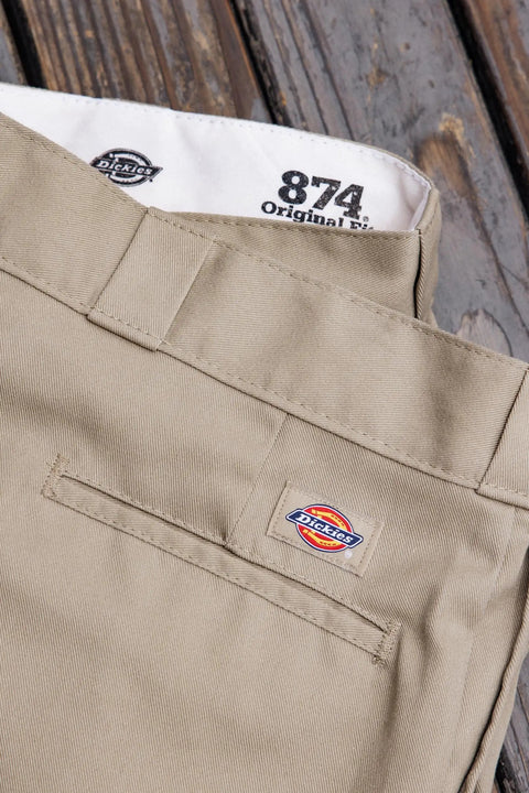 Mens Straight Leg Work Pants With Big Tall Roomy Fit Built Tough For Construction Grind And Saturday Chill Crafted From Durable Wrinkle Resistant Polyester Cotton In Khaki close-up of waistband featuring tag