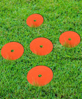 Six Pack Orange Rubber Washers for Low Profile Property Markers and Driveway Survey Stakes on grass