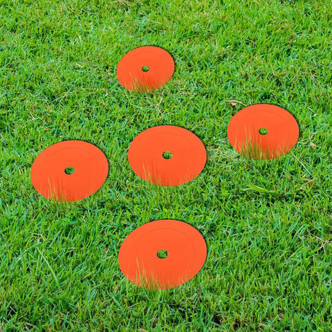 Six Pack Orange Rubber Washers for Low Profile Property Markers and Driveway Survey Stakes on grass