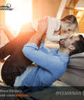 Man and child playing in living room with TruWave Natural Series A19 LED Bulb 11W, 1100 Lumens, 2700K Soft White glow