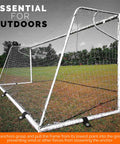 Heavy Duty Trampoline Wind Anchors Kit With Stakes And Straps securing a soccer goal on a grassy field for stable outdoor setup.