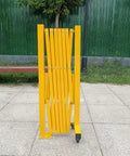 Heavy Duty Expandable Safety Barrier Gate, Rock Solid Retractable Metal Traffic Barricade Fence in folded position.
