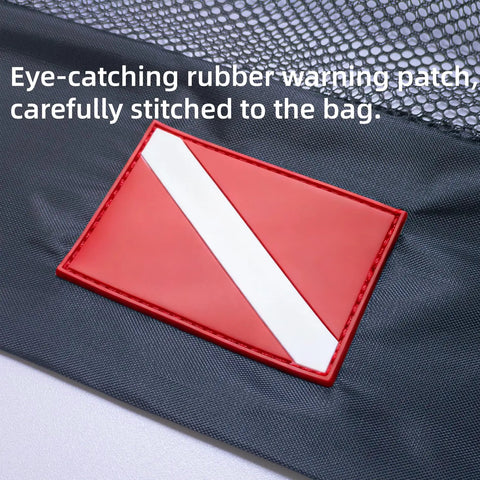 Close-up of rubber warning patch on Three Pack Scuba Diving Mesh Bags SMB Pouches For Gear And Snorkeling Equipment