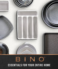 Various baking and storage pans including a gray striped dish, suitable for home organization and kitchen use.