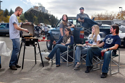 Pro 30 Single Burner Grab-and-Go Outdoor Stove with 30,000 BTU burner and adjustable legs in a tailgate setup