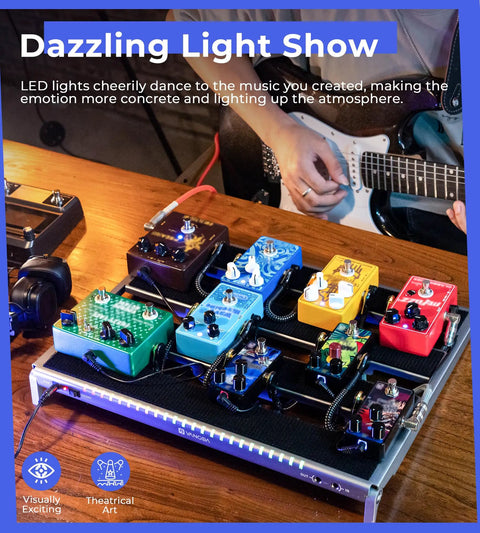 Guitar Pedalboard With Isolated Power Supply, PD-M Aluminum One-Piece Bent Frame on table with LED lights and electric guitars.