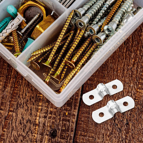 Two Heavy Duty Stainless Steel Cable Conduit Clamps beside a box filled with various screws and fasteners.