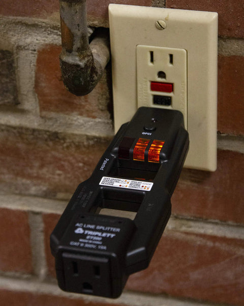 Must Have AC Line Splitter And GFCI Outlet Tester With Five Visual Indicators plugged into wall outlet