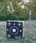 Close-up of Travel Pro Portable Layered Foam Archery Target With Welded Core in outdoor setting, 18x16x11 inches.