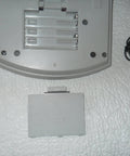 PTouch 2300 Labeling System battery compartment with cover removed, showing battery slots and power cable, no fuss stand alone