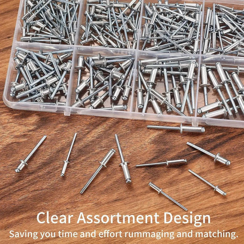 500 Piece Aluminum Blind Rivet Kit With 14 Size Assortment Pop Rivets displayed in a clear plastic box on a wooden surface