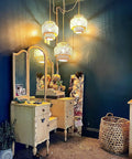 Dope Boho Plug In Pendant Light With Macrame Shade Two Pack Hanging Lights illuminating a bohemian bedroom corner.