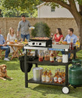 Outdoor Stainless Steel Grill Table 34 Inch Long By 20 Inch Wide With Magnetic Tool Holder Wheels Hooks Side Tray And Handle For Outdoor Cooking Pizza Oven Stand Cart in a backyard setting