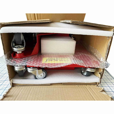 Heavy Duty Low Profile Furniture Dollies, Set Of 4 With Quiet Pu Rollers inside packaging with bubble wrap and foam cushioning.