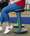 SitWell Wobble Stool With Adjustable Height For Active Seating In Classrooms And Libraries in gray, promoting core strength and posture.