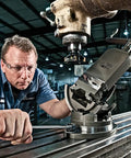 Technician using Three Axis Pro Grade Precision Tilting Vise For Milling Jig Boring 6 Inch Jaw Width on a milling machine