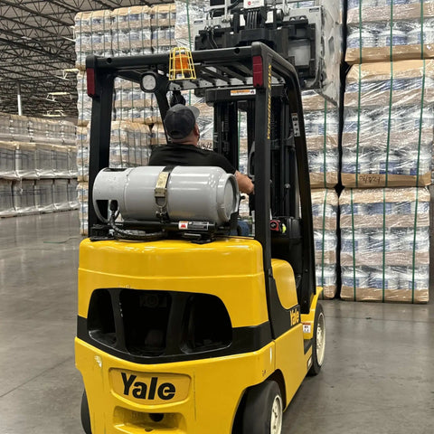 Steel Forklift Propane Tank Cylinder With Built In Gauge, 33.5 Lb Capacity on forklift in warehouse, horizontal mount