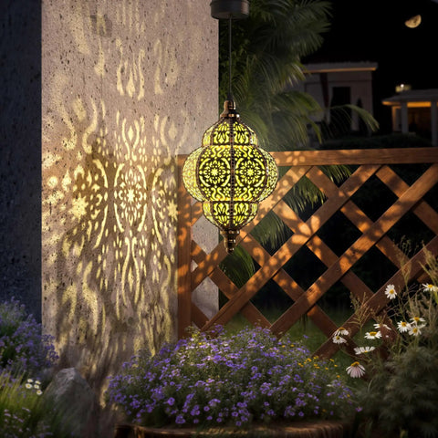 Hanging Solar Lanterns for Outdoor Decor Bronze Waterproof Garden Lights with Moroccan Style Plastic Design illuminating a wall at night