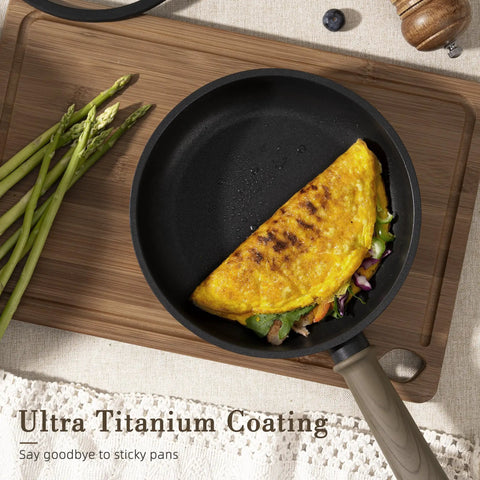 Omelette in nonstick titanium frying pan from 19 piece set for induction cooktops, easy clean, PTFE PFOA PFOS free, healthy kitchenware.