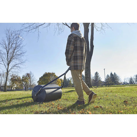 Person using Lawn Roller 18 Inch Diameter 24 Inch Wide Poly Drum Holds Up To 270 Lbs And 31.1 Inch Working Width For Versatile Push And Tow
