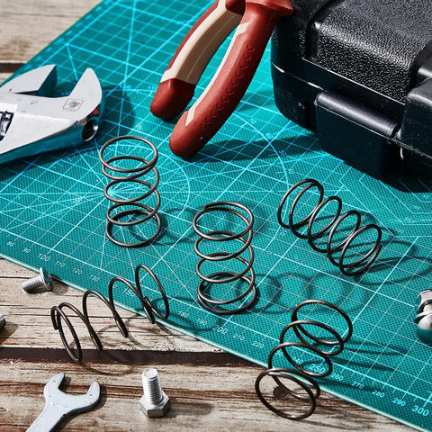 Six Pack Trimmer Replacement Springs For 29550 Model Weed Eater Outdoor Lawn Tools Durable Steel Spare Parts Compatible With 678749001 Ideal For Quick Repairs And Extra Replacement Keeps Your Trimmer Running Smooth scattered on workbench