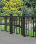 Top Shelf 36 Inch Aluminum Pool Fence Gate Kit With Rugged Hinges And Solid Hardware Slick Matte Black Finish installed in a garden.