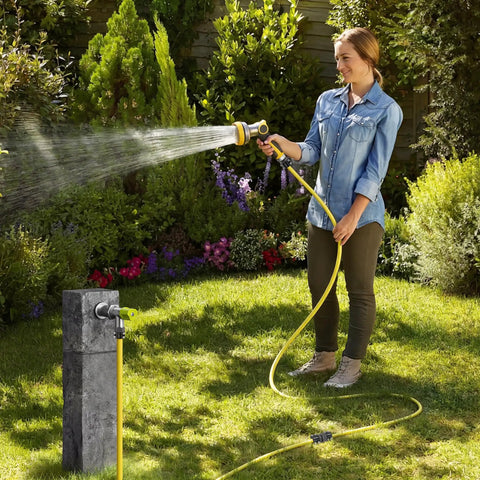 Fix Your Leak In No Time With This Heavy Duty 3/4 Inch Garden Hose Repair Kit Featuring Upgraded Aluminum Clamps And Extra Washers For A Total Zero Leak Fix. Woman watering garden with yellow hose and repair clamps on sprinkler line.