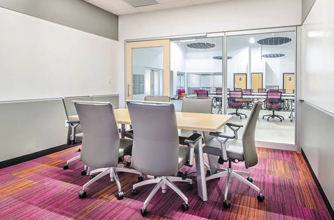 Office meeting room with Black Vinyl Wall Base 4 Inch By 20 Foot Peel And Stick No Mess Self Adhesive Floor Trim visible.