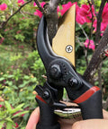 8 Inch Titanium Coated Bypass Pruning Shears For Heavy Duty Garden Pruning Premium SK5 Steel Blade Rust Resistant And Ultra Sharp Ergonomic Non Slip Aluminum Handles For Smooth Cutting trimming a branch