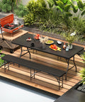 Six Foot Folding Picnic Table Set With Two Benches HDPE Wood Pattern Top on patio with food and grill, black