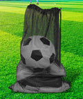 Oversized black mesh gear bag holding a soccer ball on grass, part of the Set Of 2 Oversized Mesh Gear Bags 19 By 27 Inches In Black And Blue.
