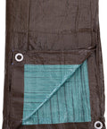 Heavy Duty All Purpose Poly Tarp 25 By 40 Ft 5 Mil Waterproof Reversible Brown And Green Outdoor Cover folded with grommets