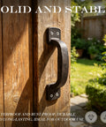Heavy Duty Cast Iron Door Pull Handles Set Of 2 In Black Antique Finish for sliding doors, attached to wooden outdoor gate.