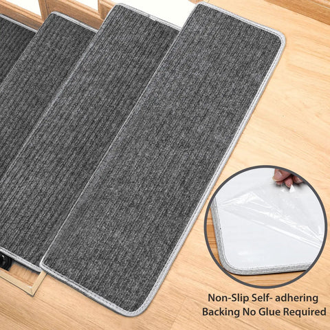 Grey Stair Tread Carpet Runner Set with Adhesive Backing and Nonskid Grip, 9.5 by 30 by 1.2 inches, shown on stairs.