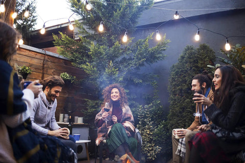 Group enjoying outdoor space under 25 Pack 2W S14 LED Bulbs Replacement for Outdoor String Lights, 2700K Soft Warm White