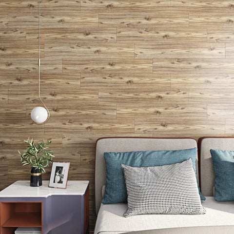 Wood Look Peel And Stick Vinyl Plank Flooring 6x36 Inches in a modern bedroom setting with pillows and lamp.