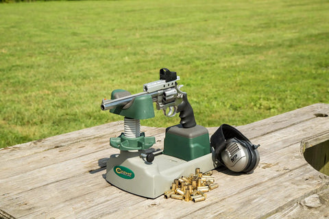 Pistolero Pistol Sight Adjustment Kit with 5 Inch Horizontal and 3 Inch Vertical Travel in use at outdoor range on table.