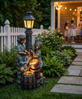 47-Inch Outdoor Water Fountain With 3-Tier Boy And Girl Resin Waterfall, Calming Water Sounds And Warm LED Lights in garden