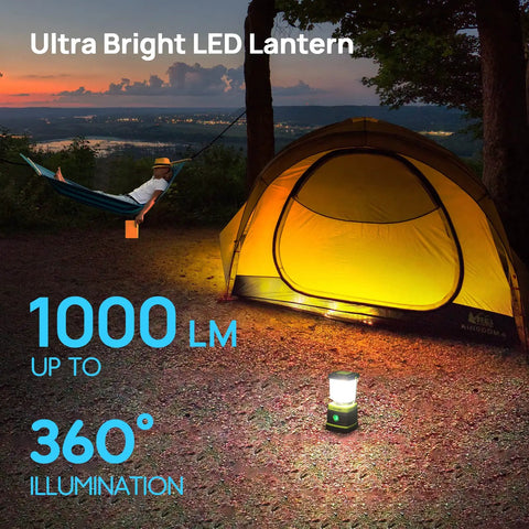 Ultra Bright LED Camping Lantern 1000 Lumens with Four Light Modes illuminating yellow tent and man in hammock at campsite.