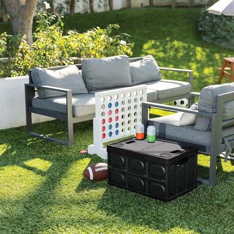 Big Time Heavy Duty Collapsible Storage Bin With 16 Gallon Capacity on grass beside outdoor seating set.